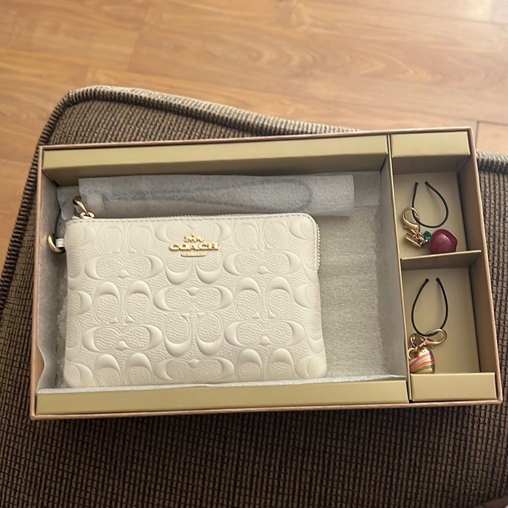Coach wallet with charms